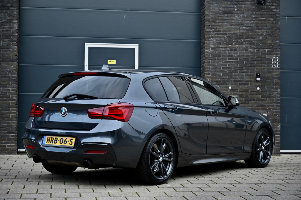 BMW 1 Serie M140i xDrive 480PK | Mineral Grau | Akrapovic | Sublieme staat 52218950-4.jpg | Stan Automotive